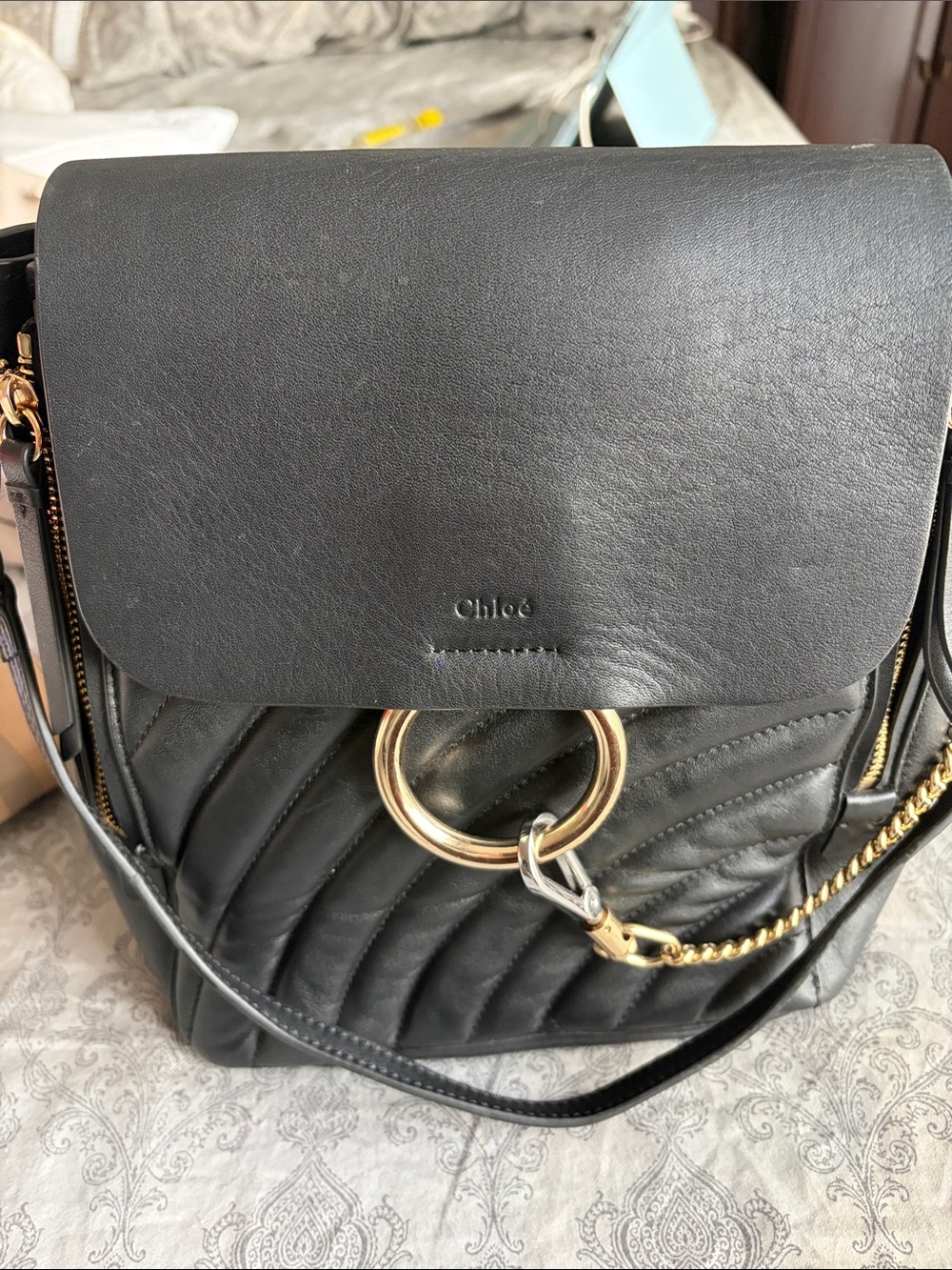 Black Quilted Leather Shoulder Bag with Gold Ring Detail